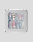 Girlhood: Pastel Chrome Nails with Swirl Designs